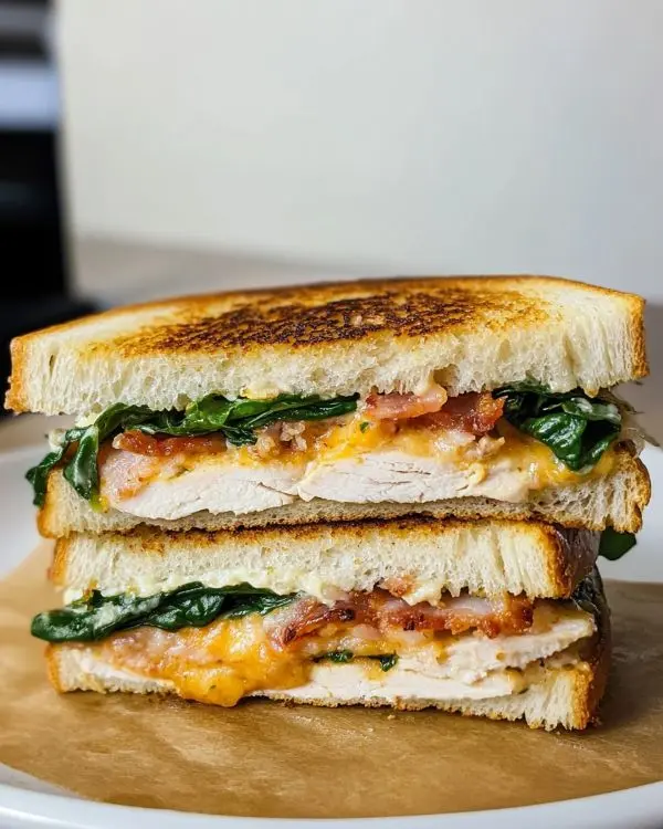 Cheddar and Bacon Turkey Melt on Sourdough 3 Turkey Melt with Cheddar, Spinach, and Bacon