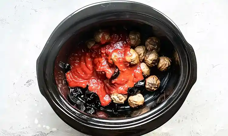 Preparing Crockpot Meatballs with Grape Jelly Sauce