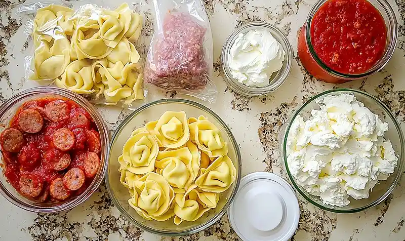 Creamy Sausage and Tortellini Dump Bake 4 Main ingredients for Creamy Sausage and Tortellini Dump Bake