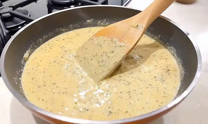 preparing Creamy Cajun for Chicken with Garlic Rice
