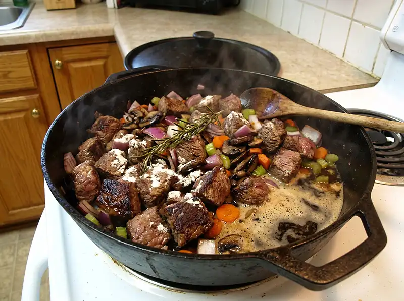 Guinness Pie 4 browned brisket chunks with dark crusts and flour patche